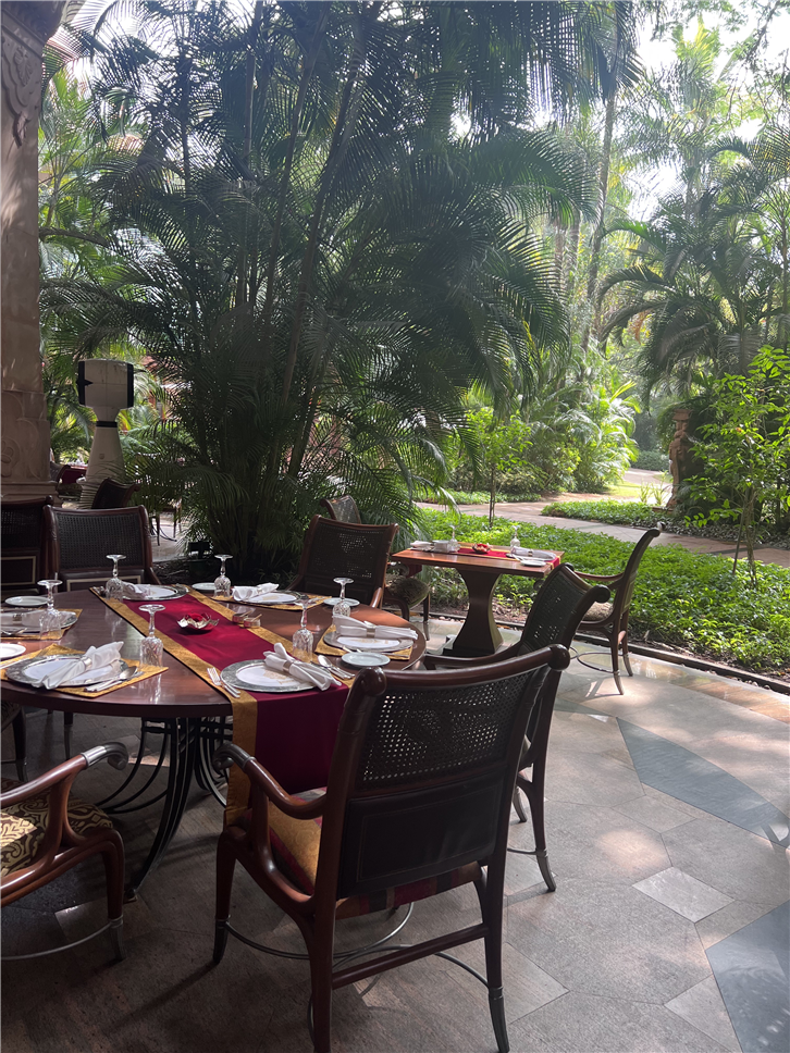 leela-bangalore-jamavar 4032 seating outside good-crop-v2.jpeg